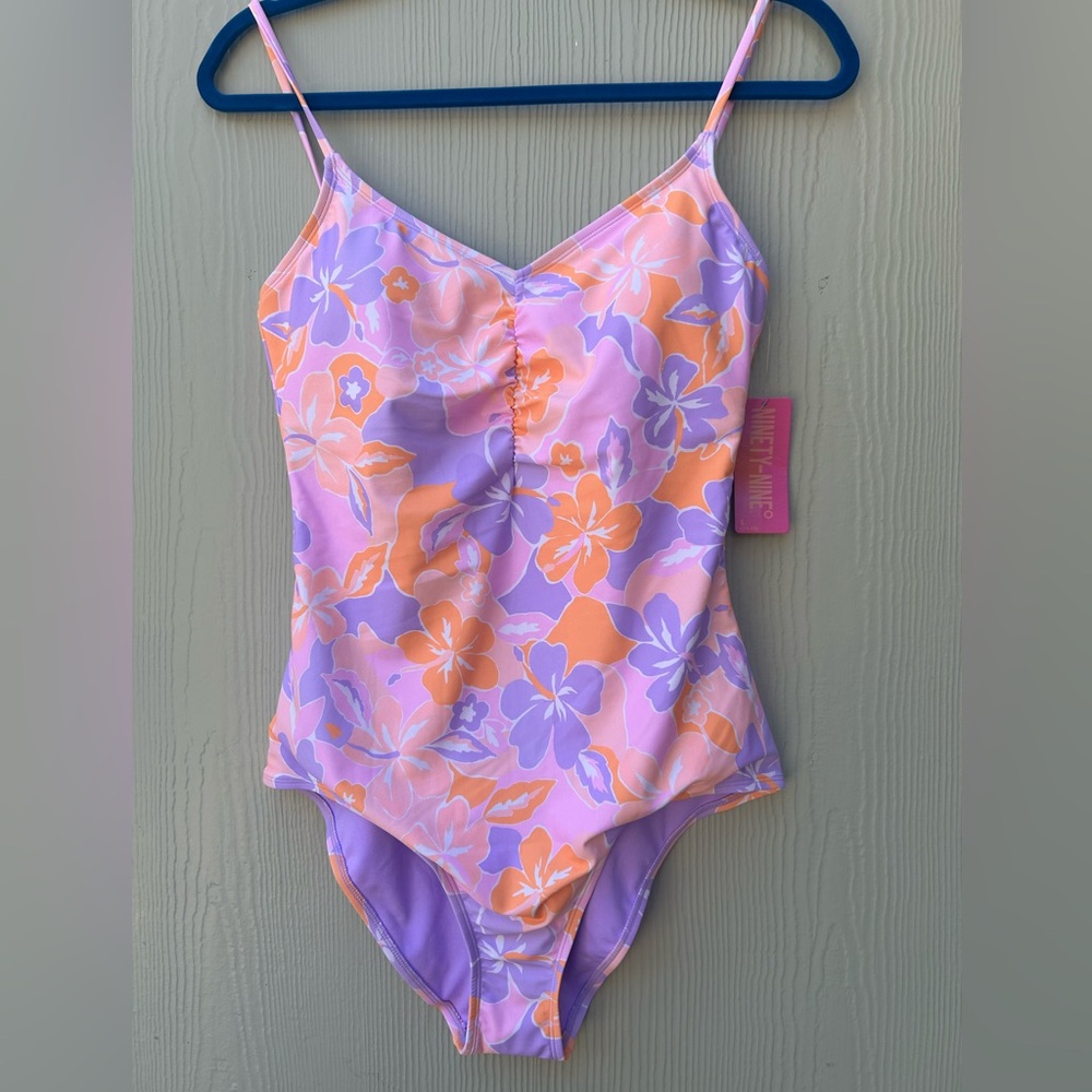 Ninety One Piece Purple and Orange Swimsuit Vibrant Design